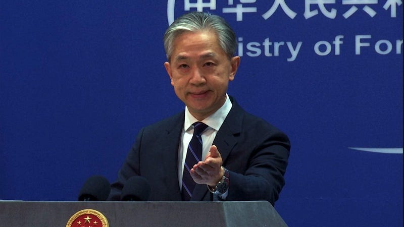 In this image made from video, Chinese Foreign Ministry spokesperson Wang Wenbin gestures as he speaks during a media briefing at the Ministry of Foreign Affairs office in Beijing, Monday, Feb. 13, 2023. China on Monday said more than 10 U.S. high-altitude balloons have flown in its airspace during the past year without its permission, following Washington's accusation that Beijing operates a fleet of surveillance balloons around the world. (AP Photo/Liu Zheng)