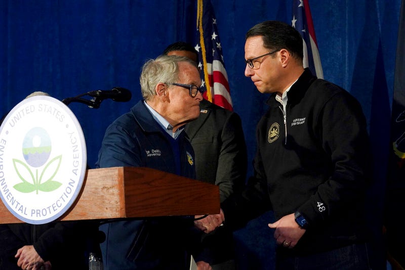 Ohio Gov. Mike DeWine greets Pennsylvania Gov. Josh Shapiro during a news conference in East Palestine, Ohio, Tuesday, Feb. 21, 2023.