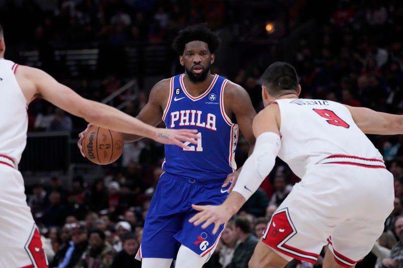 Philadelphia 76ers' Joel Embiid brings the ball up during the first half of an NBA basketball game against the Chicago BullsWednesday, March 22, 2023, in Chicago.