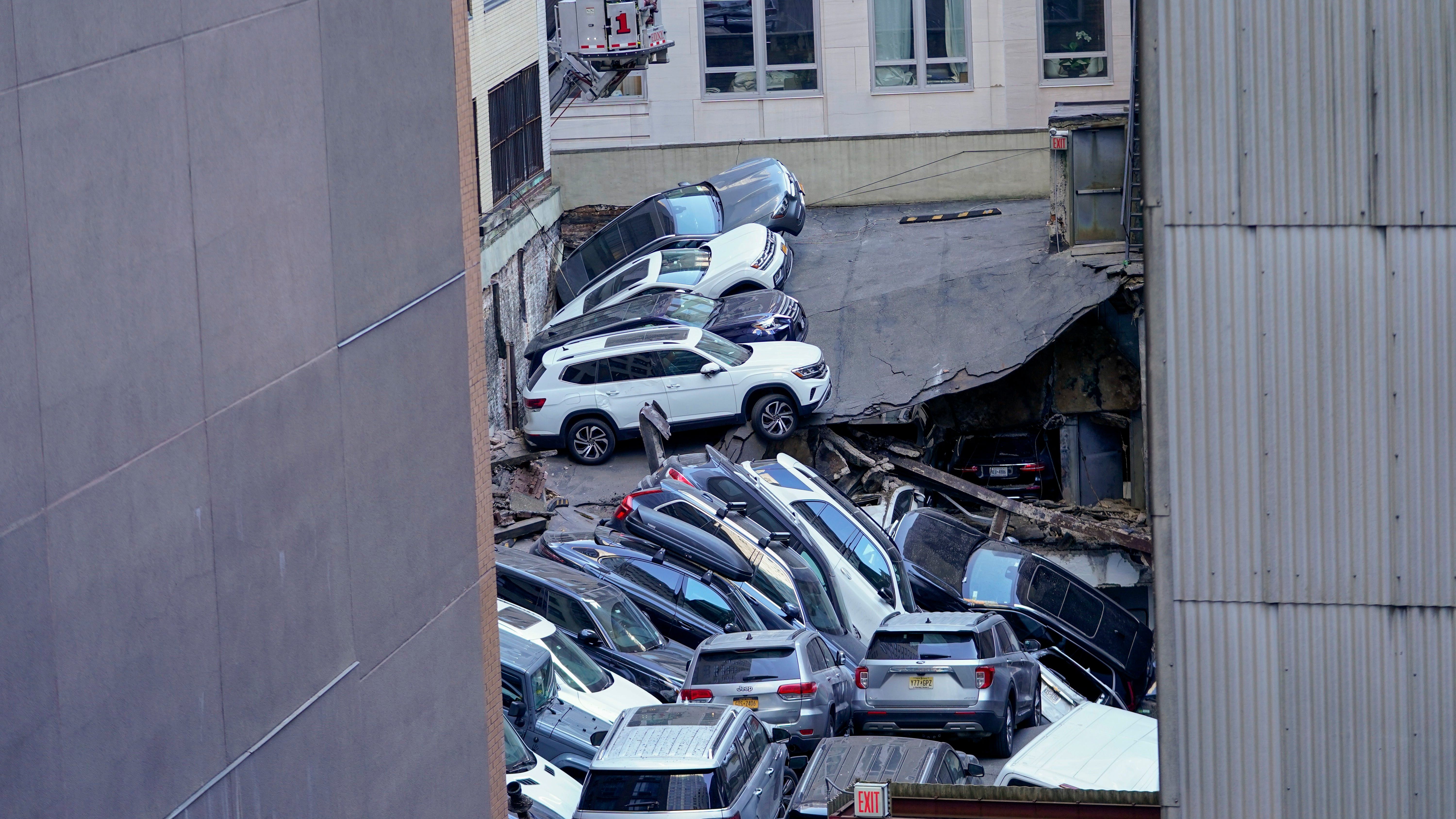 FIDI PARKING GARAGE COLLAPSE: 1 dead, 5 injured after 3-story garage caves in