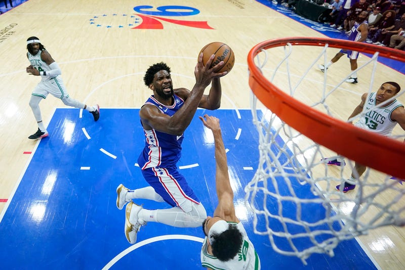 Philadelphia 76ers' Joel Embiid shoots against Boston Celtics' Derrick White during the second half of Game 6 of an NBA basketball playoffs Eastern Conference semifinal, Thursday, May 11, 2023, in Philadelphia.