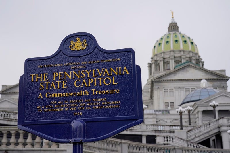 FILE - An historical marker at the Pennsylvania Capitol in Harrisburg, Pa., is seen on Feb. 21, 2023. Authorities could temporarily seize firearms and background checks would be expanded for gun buyers, under two bills passed Monday, May 22, 2023, in the Pennsylvania House, where Democrats are using their razor-thin majority to push gun-control measures after a yearslong standstill in the politically divided government. (AP Photo/Matt Rourke, File)