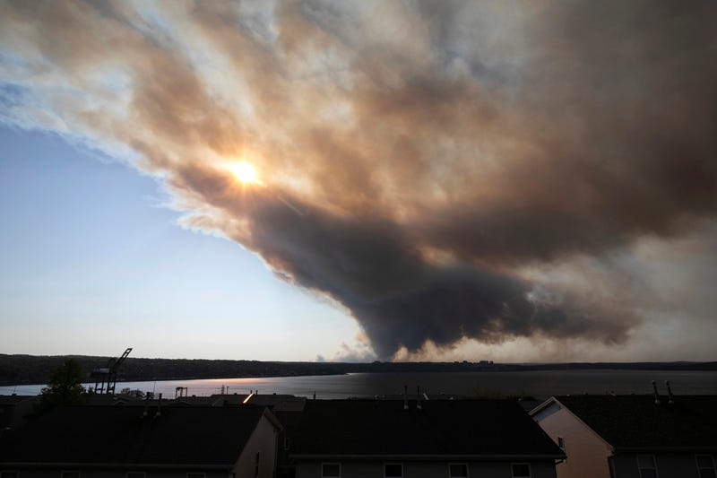 Thick plumes of heavy smoke fill the Halifax sky as an out-of-control fire in a suburban community quickly spread, engulfing multiple homes and forcing the evacuation of local residents, in Halifax, Nova Scotia, on May 28, 2023. 