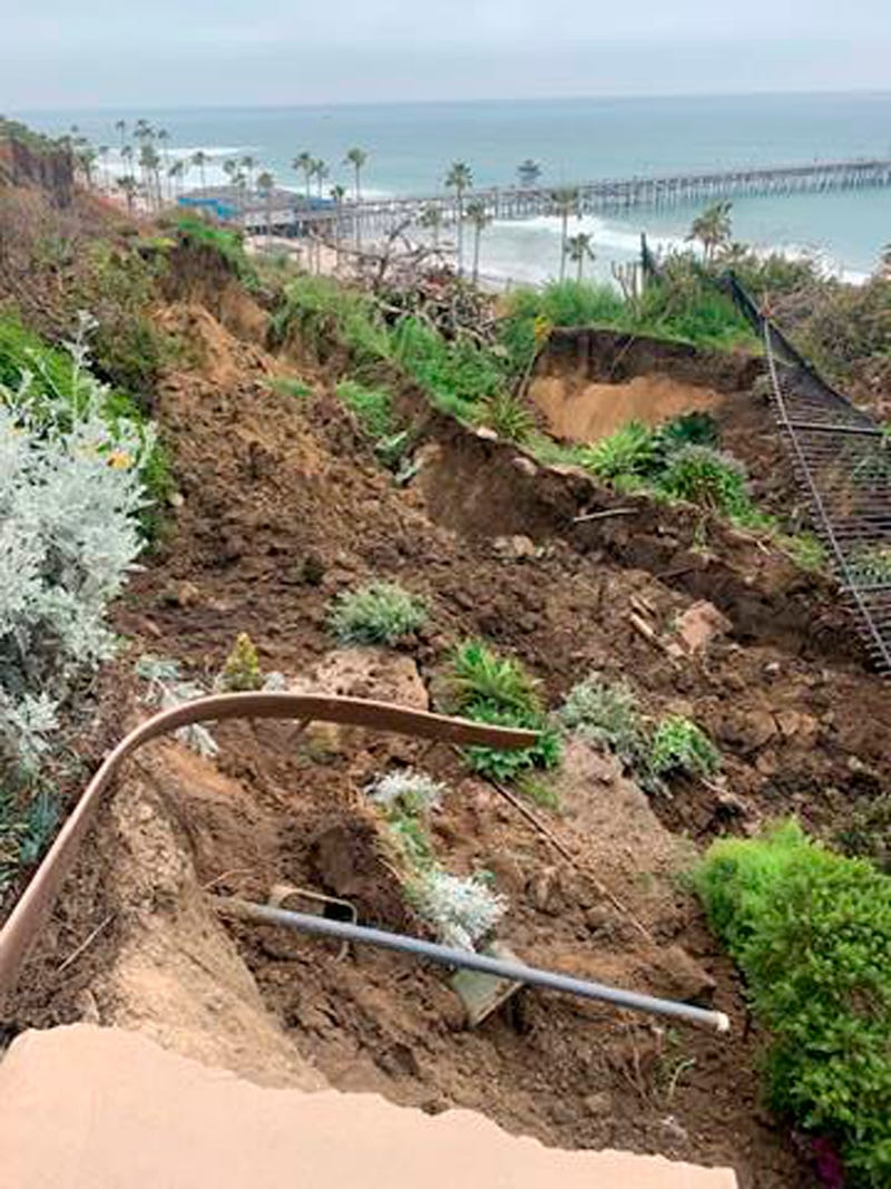FILE - This photo provided by the City of San Clemente, shows damage from a landslide on the western side of the Casa Romantica and Cultural Center and Gardens in San Clemente, Calif., on April 27, 2023. Passenger rail service has been restored along a section of the Southern California coast a month after a landslide damaged a historic building and threatened seaside tracks.Amtrak's Pacific Surfliner service and regional Metrolink trains resumed travel through the Orange County city of San Clemente during the Memorial Day weekend, both railroads announced on their websites.