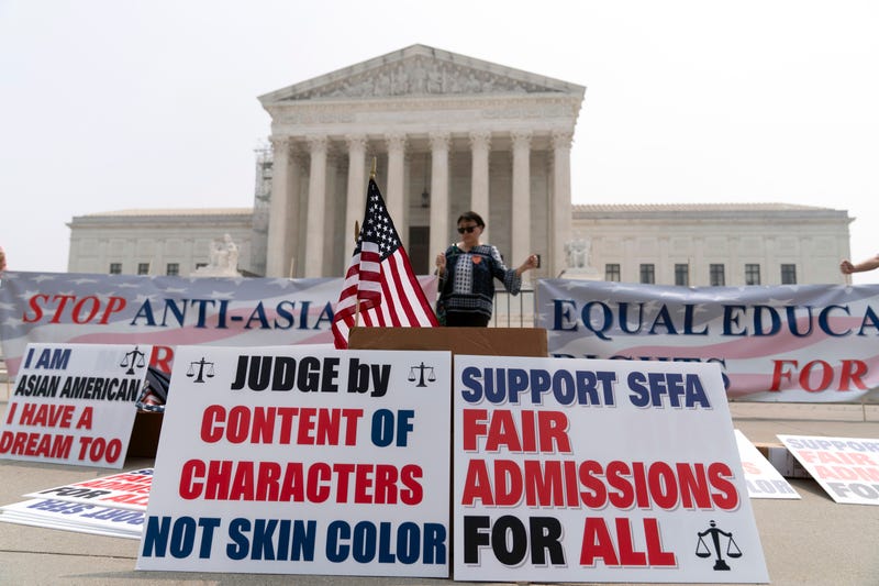 A person protests outside of the Supreme Court in Washington, June 29, 2023. The Supreme Court struck down affirmative action in college admissions, declaring race cannot be a factor and forcing institutions of higher education to look for new ways to achieve diverse student bodies.