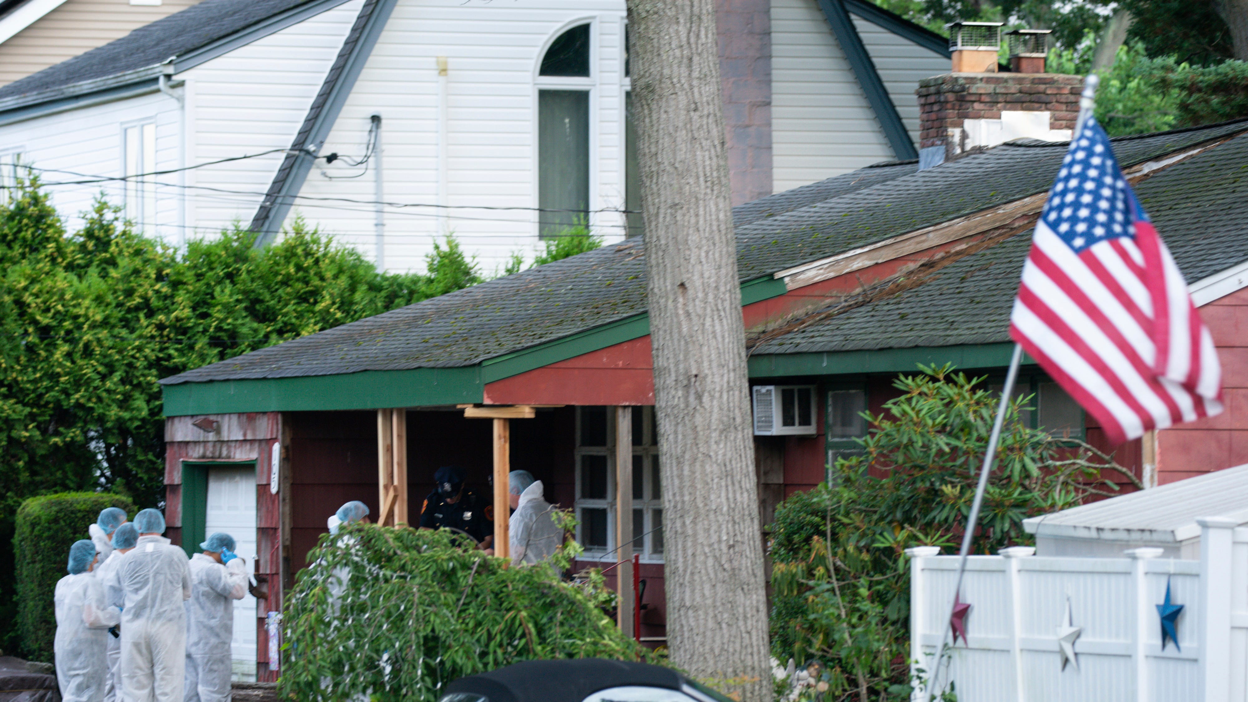 PHOTOS: Frenzy of activity at LI home of suspect in Gilgo Beach murders