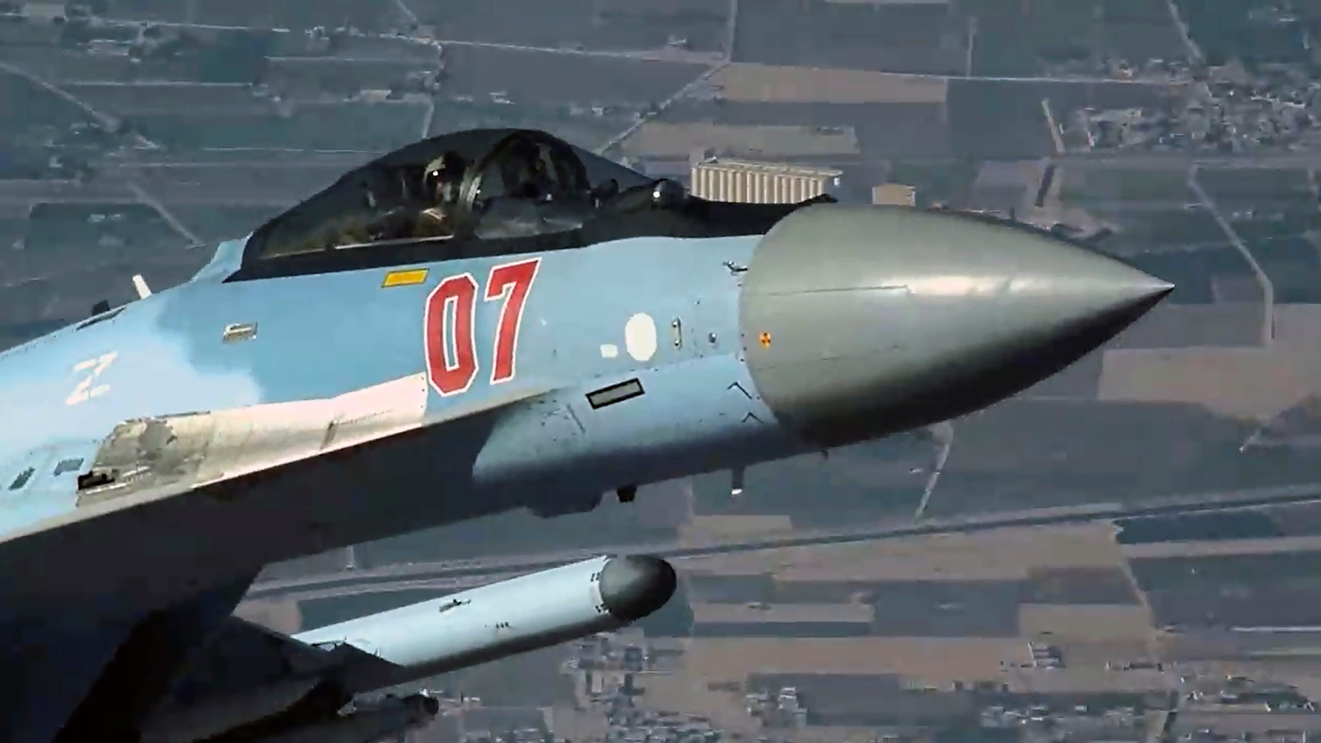 A Russian fighter jet fired flares at a US drone over Syria and damaged it, the US military says