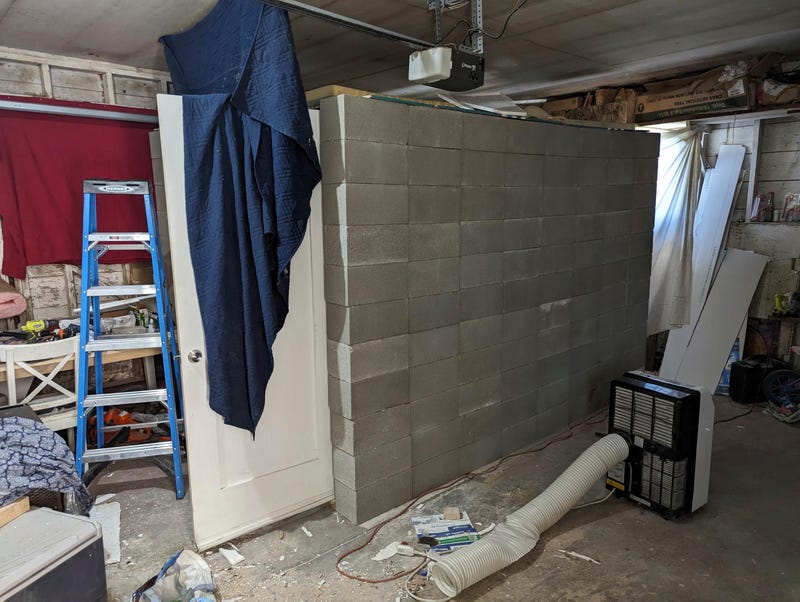 This undated photo provided by the FBI's Portland Field Office shows the interior of a makeshift cinder block cell in Klamath Falls, Ore., allegedly used by Negasi Zuberi.