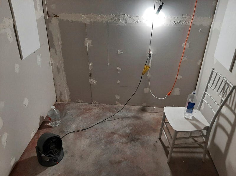 This undated photo provided by the FBI's Portland Field Office shows the interior of a makeshift cinder block cell in Klamath Falls, Ore., allegedly used by Negasi Zuberi.