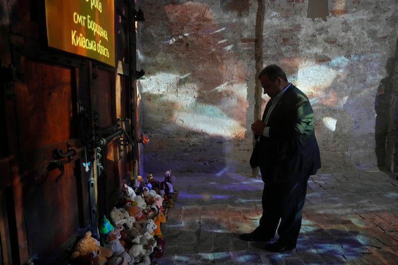 Republican presidential candidate former New Jersey Gov. Chris Christie pays tribute to Ukrainian children killed during Ukrainian-Russian war in the National Museum of the History of Ukraine in the Second World War, Kyiv, Ukraine, Friday, Aug. 4, 2023