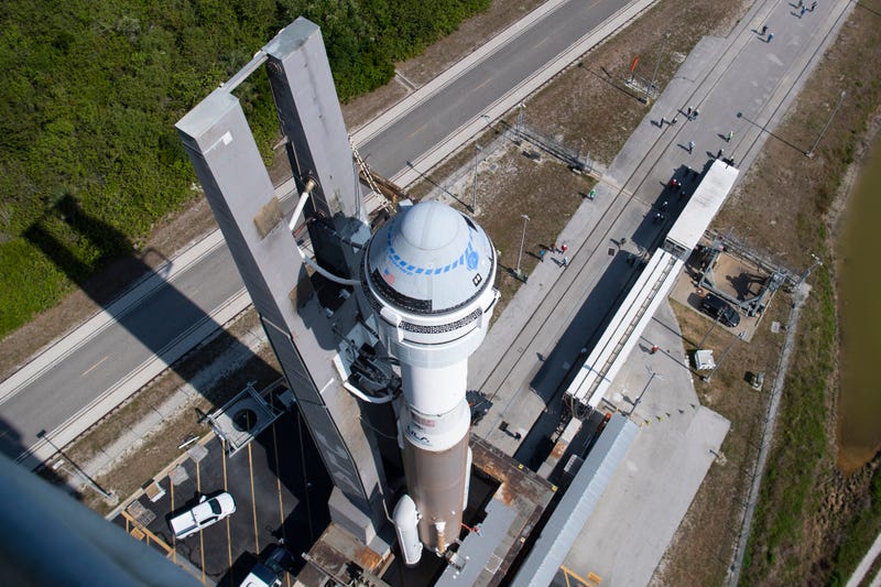 FILE - A United Launch Alliance Atlas V rocket with Boeing's CST-100 Starliner spacecraft is rolled out of the Vertical Integration Facility, May 18, 2022 at Cape Canaveral Space Force Station in Florida. Boeing’s first Starliner flight with astronauts aboard has been delayed until at least next March. 