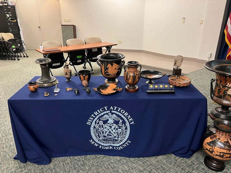 In this picture made available by the Italian Carabinieri, paramilitary police, Friday, Aug. 11, 2023, some of the 266 antiquities returned from the United States to Italy are displayed during a handing over ceremony to the offices of the Manhattan district attorney. 