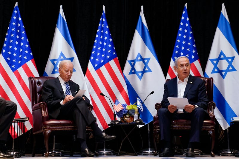President Joe Biden and Israeli Prime Minister Benjamin Netanyahu participate in an expanded bilateral meeting with Israeli and U.S. government officials, Wednesday, Oct. 18, 2023, in Tel Aviv.
