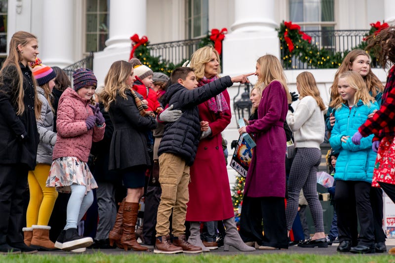 Jill Biden and military kids sort toys the White House donated to the Marine Corps Reserve program