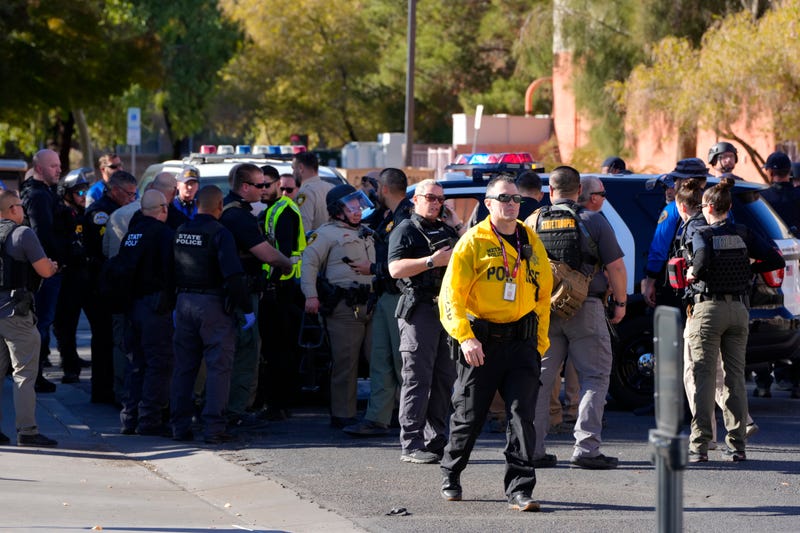 Las Vegas Metro Police respond to a shooting reported on the University of Nevada, Las Vegas, campus, Wednesday, Dec. 6, 2023, in Las Vegas.