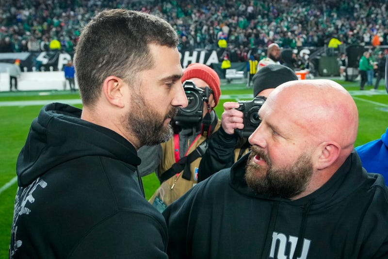 Philadelphia Eagles head coach Nick Sirianni and New York Giants head coach Brian Daboll meet on the field after an NFL football game Monday, Dec. 25, 2023, in Philadelphia. The Eagles won. (AP Photo/Matt Rourke)