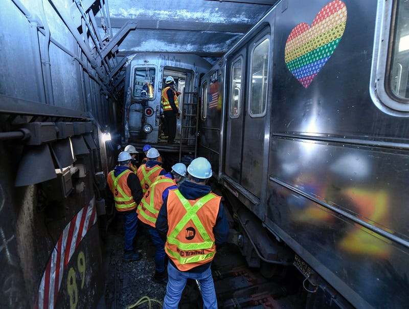 This photo provided by The Metropolitan Transportation Authority (MTA) shows emergency personnel at the scene of a train derailment of a New York City subway car, Thursday, Jan. 4, 2024