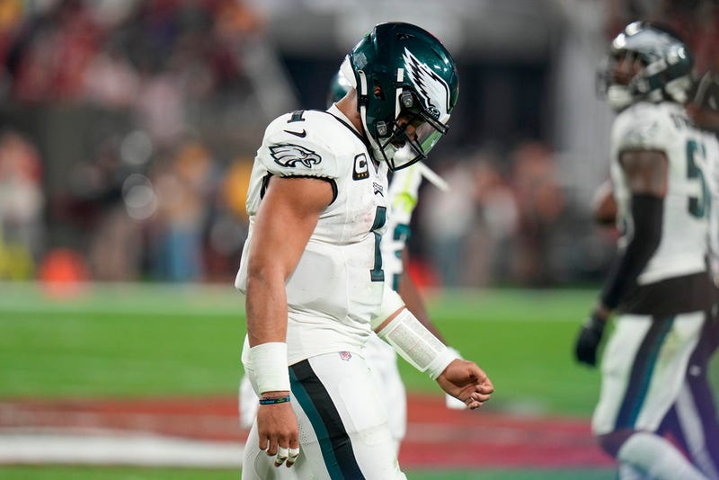 Philadelphia Eagles quarterback Jalen Hurts hangs his head after turning the ball over on downs to the Tampa Bay Buccaneers during the second half of an NFL wild-card playoff football game, Monday, Jan. 15, 2024, in Tampa, Fla. (AP Photo/Chris O'Meara)