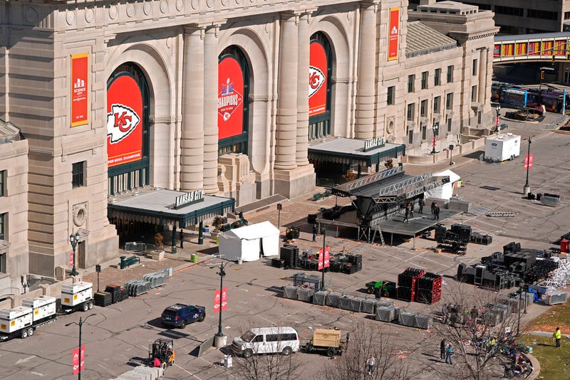 Workers dismantle the stage outside of Union Station