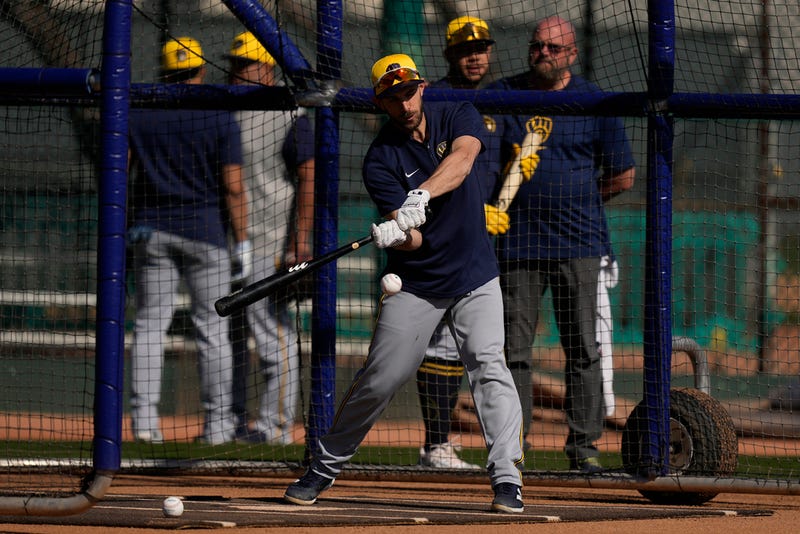 Milwaukee Brewers' Austin Nola hits during batting practice at spring training baseball workouts