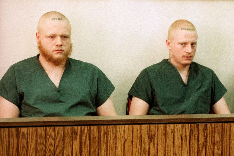 David Freeman, left, and Bryan Freeman, right, sit with Nelson Birdwell III, not pictured, as they appear in a Midland, Mich., courtroom, March 2, 1995. On Wednesday, Feb. 21, 2024, the two eastern Pennsylvania brothers sentenced to life in the slayings of their parents and younger brother almost three decades ago were resentenced to terms that may offer them a chance at parole.