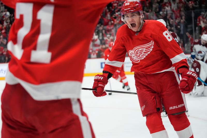 Detroit Red Wings right wing Patrick Kane (88) celebrates his goal against the Colorado Avalanche during overtime in an NHL hockey game Thursday, Feb. 22, 2024, in Detroit.