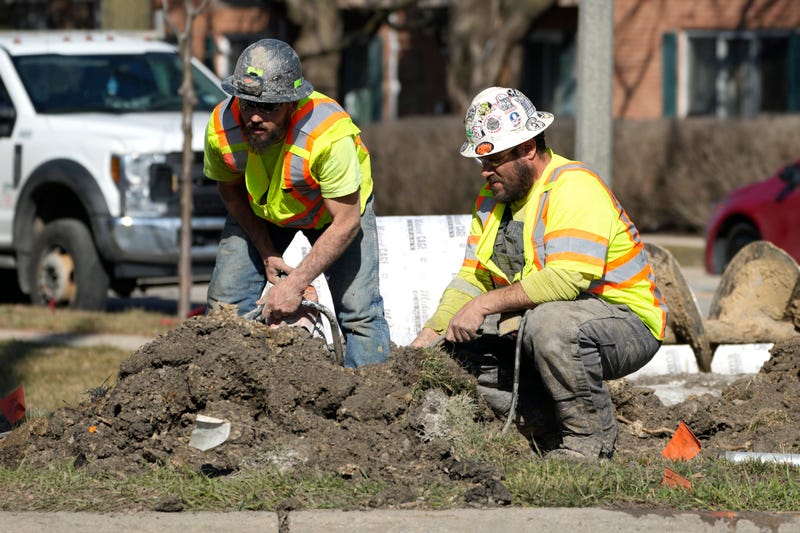 Construction workers work