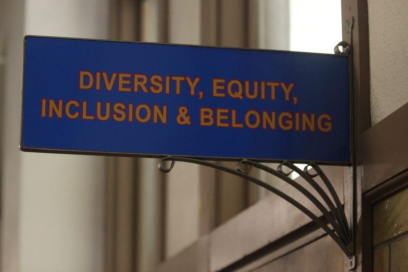 This photo shows the sign above the door to the Office of Diversity, Equity, Inclusion and Belonging inside the main administration building on the main University of Kansas campus in Lawrence