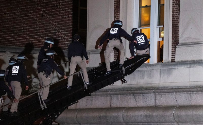 Police enter an upper floor of Hamilton Hall on the Columbia University campus using a tactical vehicle on April 30, 2024