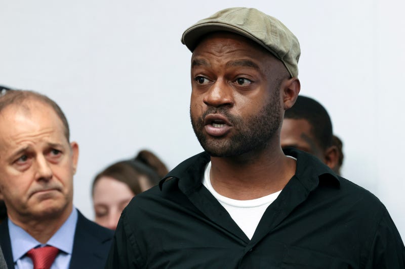 Jeffery Christian, right, speaks at a press conference in Chicago, Tuesday, May 7, 2024. Christian, along with two others, claim they were sexually abused as children while incarcerated at Illinois juvenile detention centers, stepped forward Tuesday as part of a lawsuit recounting decades of disturbing allegations of systemic child abuse.