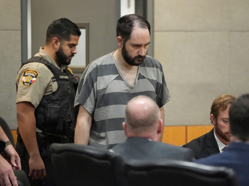 Prosecutor asks Texas court to reverse governor's pardon of Army veteran who fatally shot Air Force vet demonstrator