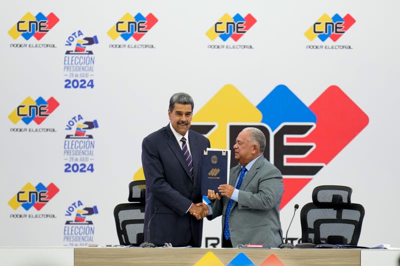 Nicolas Maduro y Elvis Amoroso
