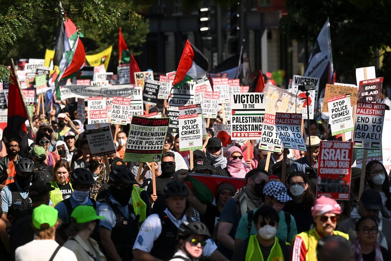 Protesters march to the Democratic National Convention after a rally at Union Park Monday, Aug. 19, 2024, in Chicago.