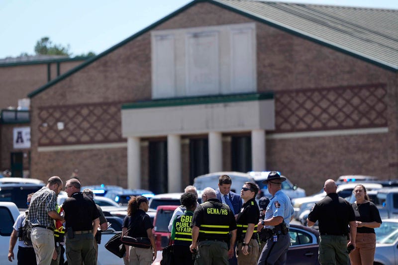 Law enforcement arrive as students are evacuated