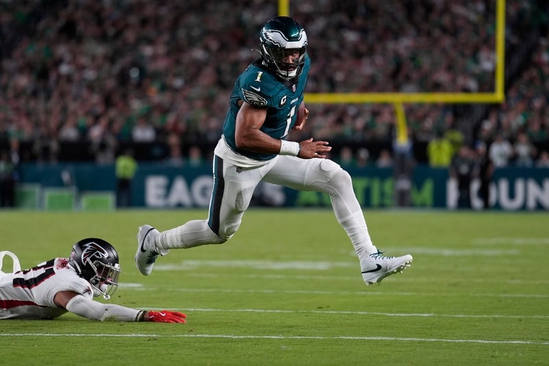Philadelphia Eagles quarterback Jalen Hurts (1) runs with the ball during the second half of an NFL football game against the Atlanta Falcons on Monday, Sept. 16, 2024, in Philadelphia. (AP Photo/Matt Rourke)