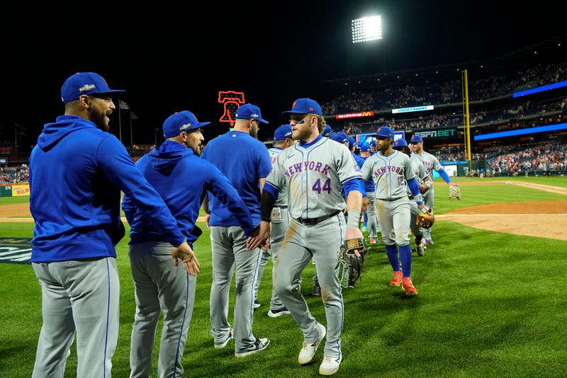 New York Mets' Harrison Bader (44) celebrates with teammates after they won Game 1 of a baseball NL Division Series against the Philadelphia Phillies, Saturday, Oct. 5, 2024, in Philadelphia.