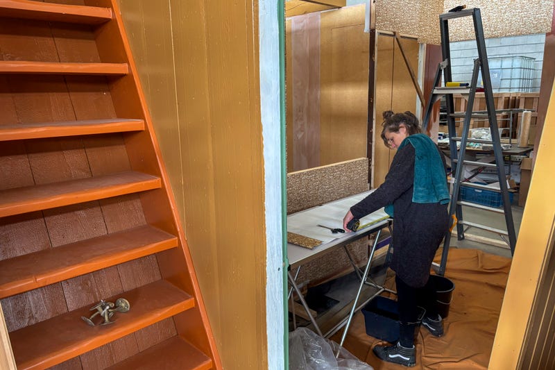 Wallpaper is being prepared for an exact replica of the secret annex which will travel to New York for an exhibit, in the village of Erp, southern Netherlands, Thursday, Oct. 10, 2024