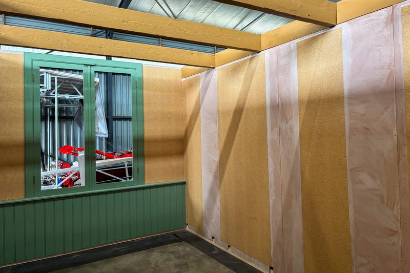 Wallpaper is being prepared for an exact replica of the secret annex which will travel to New York for an exhibit, in the village of Erp, southern Netherlands, Thursday, Oct. 10, 2024