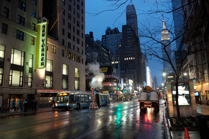 The New Yorker Hotel sign glows at dusk, Wednesday, April 17, 2013 in New York