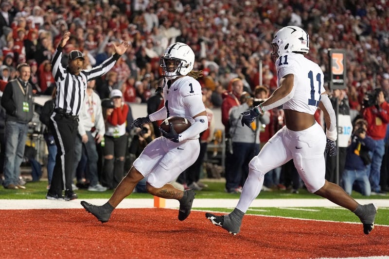 Penn State's Jaylen Reed (1) reacts after intercepting a pass and returning it for a touchhdown during the second half of an NCAA college football game against the Wisconsin Saturday, Oct. 26, 2024, in Madison, Wis.