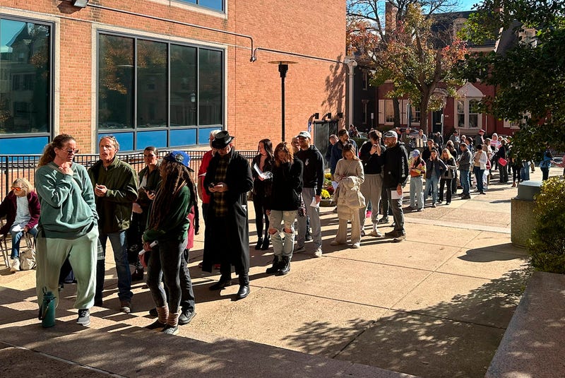 People wait in line outside the Bucks County government building in Doylestown to apply for an on-demand mail-in ballot on Tuesday, the last day to request one.