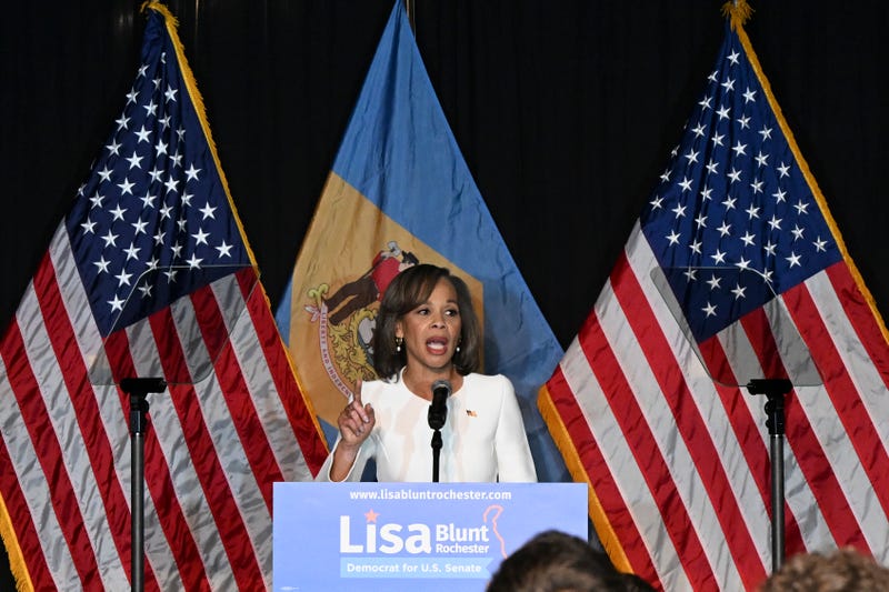 Lisa Blunt Rochester standing at a podium on election day
