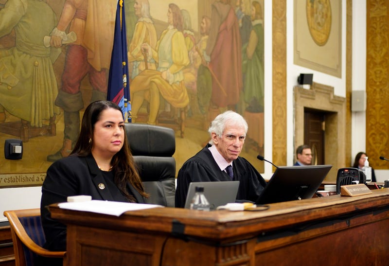 Judge Arthur Engoron (R) and principal law clerk Allison Greenfield (L) sit on the bench during Donald Trump's civil business fraud trial at New York Supreme Court, Oct. 17, 2023, in New York.
