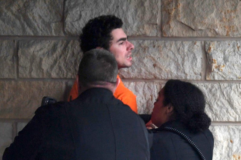 Luigi Nicholas Mangione is escorted into Blair County Courthouse on Dec. 10, 2024, in Hollidaysburg, Pennsylvania. 