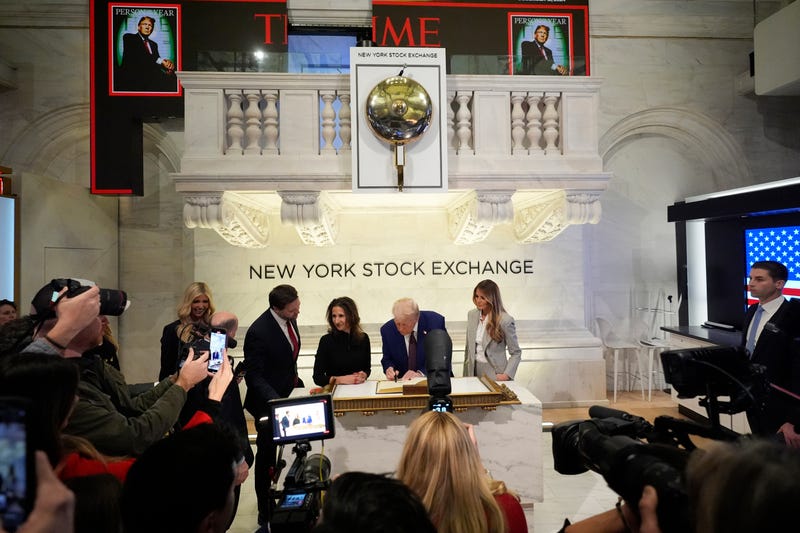 President-elect Donald Trump signs a guest book after ringing the opening bell at the New York Stock Exchange, Thursday, Dec. 12, 2024, in New York