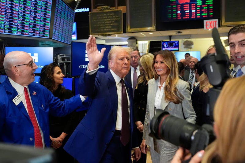 President-elect Donald Trump, with Lynn Martin, President NYSE, center, Melania Trump, right and trader Peter Giacchi, left, walks the floor of the New York Stock Exchange, Thursday, Dec. 12, 2024, in New York