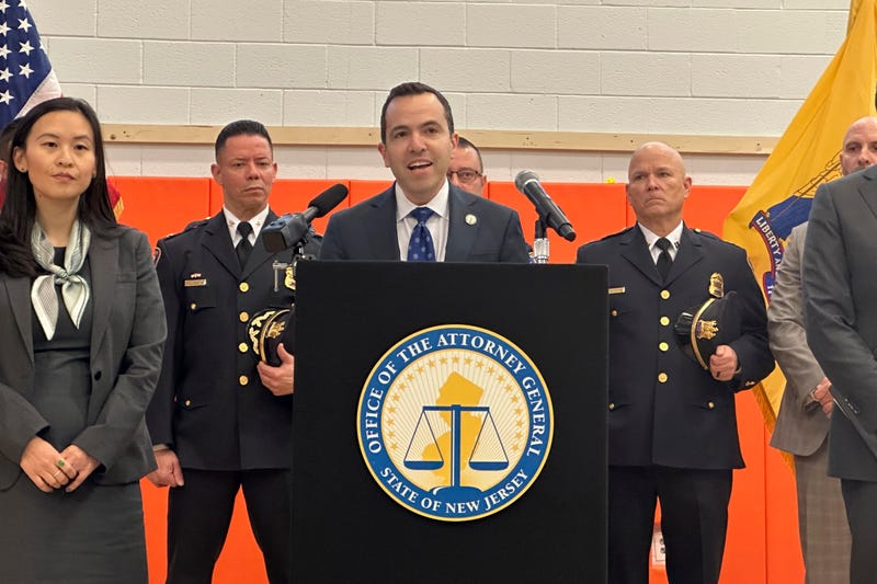 New Jersey Attorney General Matt Platkin announces he and Minnesota Attorney General Keith Ellison are suing Glock gun manufacturer to get them to stop selling guns that can be modified with a switch to turn into a machine gun-like weapon, Dec. 12, 2024, in Newark, New Jersey. 