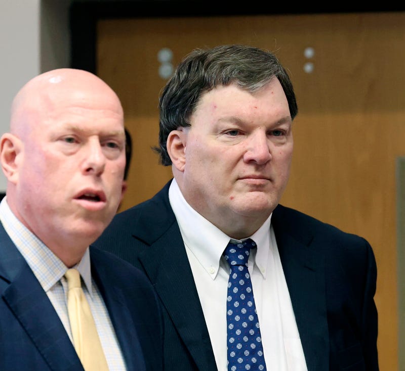 Rex A. Heuermann stands with his lawyer Michael Brown during a court hearing where he was charged with killing Valerie Mack, inside Supreme Court Justice Timothy Mazzei's courtroom at Suffolk County Court in Riverhead, N.Y. on Tuesday, Dec. 17, 2024