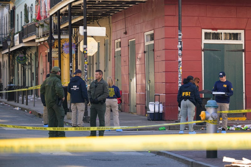 The FBI investigates the area on Orleans St and Bourbon Street by St. Louis Cathedral in the French Quarter where a suspicious package was detonated after a person drove a truck into a crowd earlier on Bourbon Street on Wednesday, Jan. 1, 2025. (AP Photo/Matthew Hinton) The FBI investigates the area on Orleans St and Bourbon Street by St. Louis Cathedral in the French Quarter where a suspicious package was detonated after a person drove a truck into a crowd earlier on Bourbon Street on Wednesday, Jan. 1, 2025. (AP Photo/Matthew Hinton)