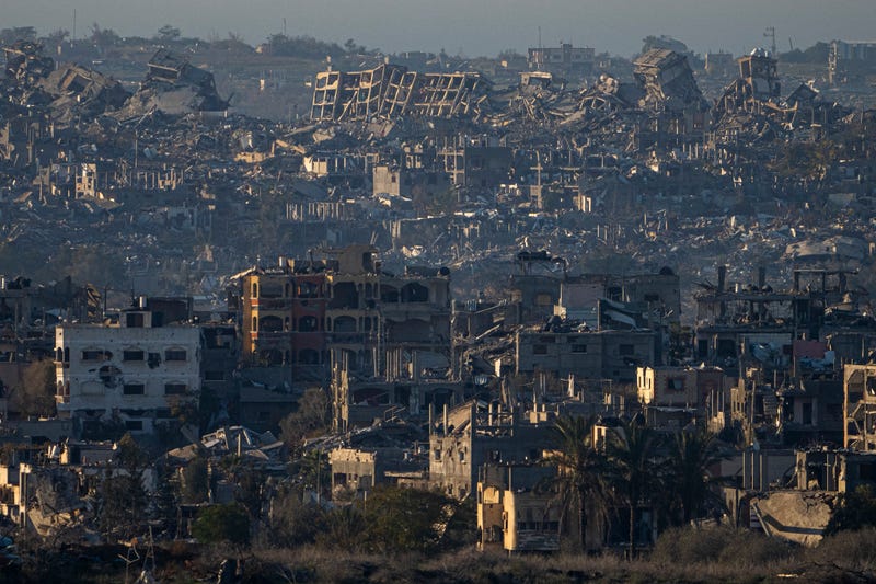 Destroyed buildings are seen inside the Gaza Strip from southern Israel, Monday, Jan. 13, 2025